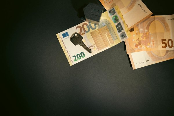 How can you enhance natural light in a UK home with limited windows?